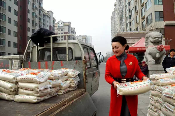 民泰地产冬季温暖启动5万斤爱心大米捐助